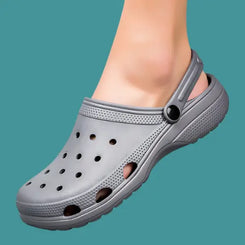Gray CrocsOrtho clogs featuring breathable material and a non-slip sole, perfect for summer comfort and style.