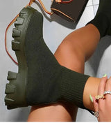 BootyComfort Women’s Casual Fashion Sneakers featuring a stylish black upper and chunky sole for comfort and support.